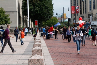 Students walk along Commonwealth Avenue near Marsh Plaza on campus. PHOTO BY SARAH FISHER/DAILY FREE PRESS STAFF